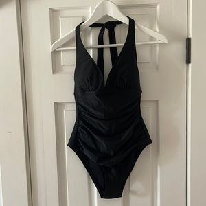 Swimming suit one piece in black. Size M.
